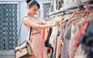 Lady browsing through clothes